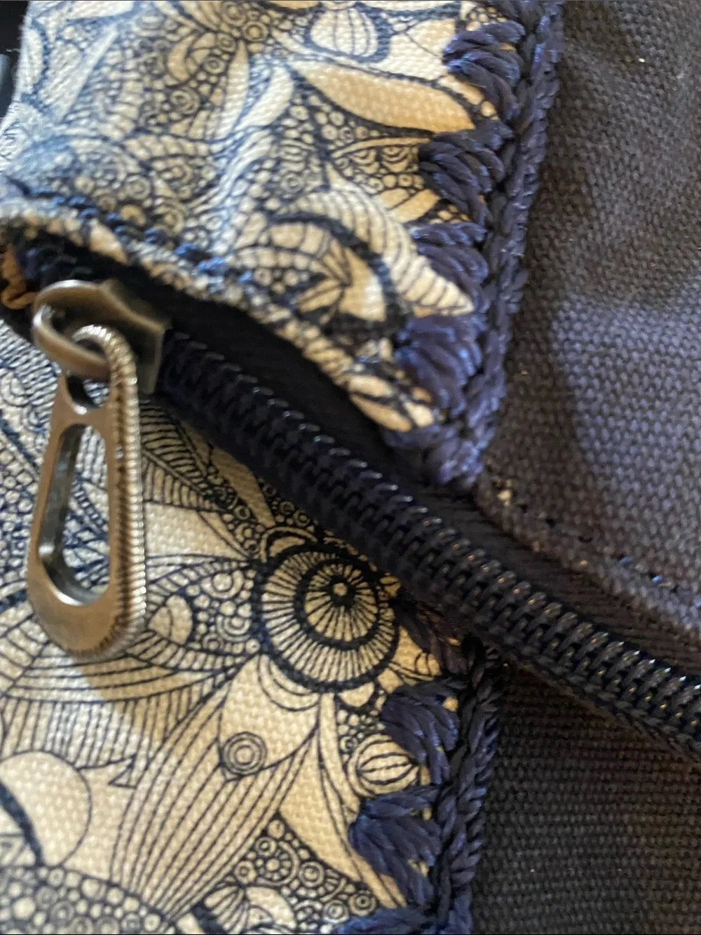 Sakroots Navy and White Floral Crossbody with Tassel Accent